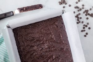 Freshly baked chocolate brownie in a baking dish.